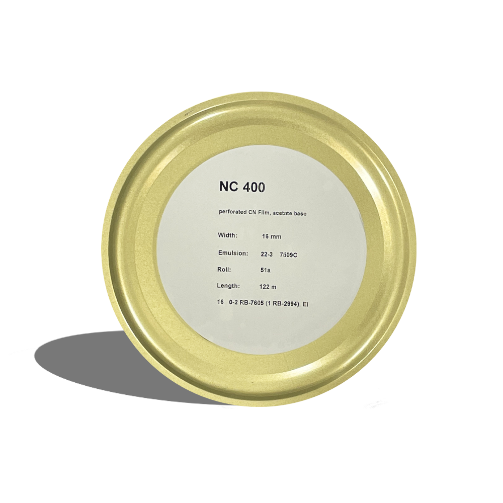 A gold-plated metal plate featuring the inscription "nc - 400" elegantly etched into the material. 16mm motion picture film​,
motion picture film,
35mm motion picture film​,
motion picture film 35mm,
motion picture film 35mm​