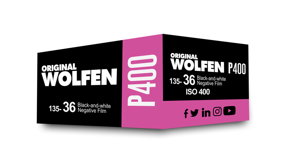 Original Wolleren P400 film roll displayed on a neutral background, showcasing its vintage packaging and branding.